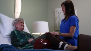 Evergreen Senior Living | Associate helping resident