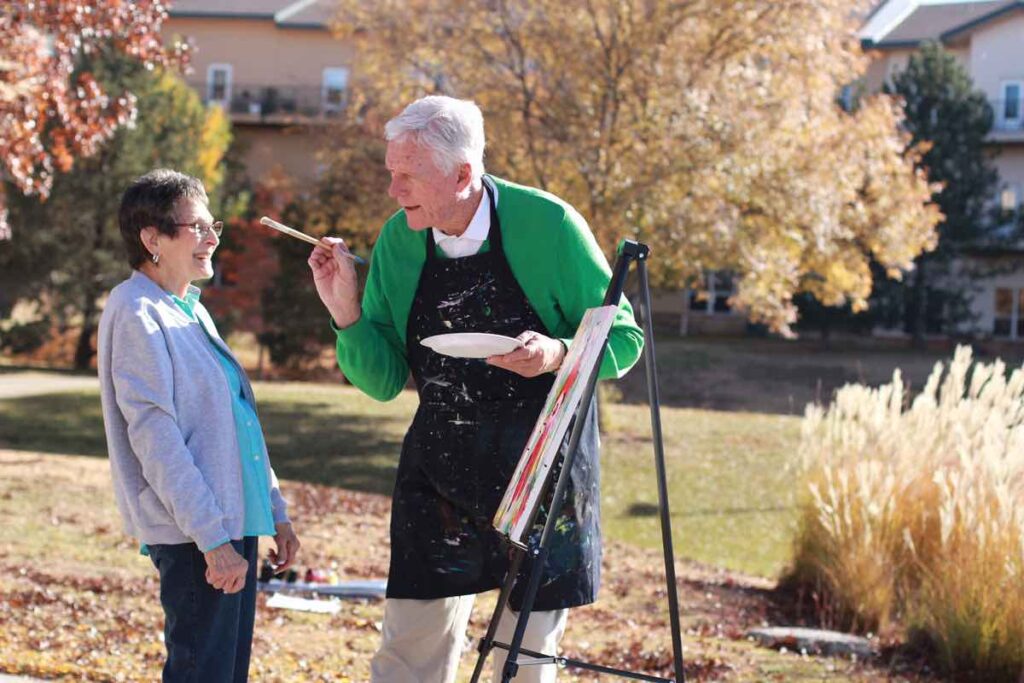 ER Senior Management | Residents painting outdoors