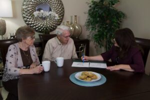 Evergreen Senior Living | Residents speaking with associate